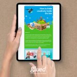 A person is holding a tablet with an article titled How to think creatively inside the box displayed on the screen. The Glued Limited logo stands prominently at the bottom, amidst text discussing creativity with packaging boxes by the renowned marketing agency in Warwickshire.