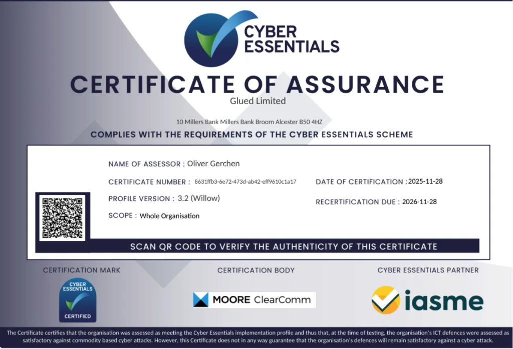 Cyber Essentials Certificate of Assurance for Glued Limited, assessed by Oliver Gerchen, version 3.2. Certified on 2023-11-28 for Cyber Security, recertifying due 2024-11-28, featuring IASME and MOORE ClearComm logos.