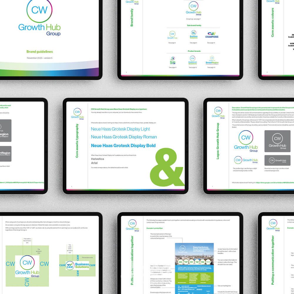 Glued Limited creative work: A top-down view of tablet screens displaying pages from a brand guidelines document for CW Growth Hub Group, featuring logos, colour schemes, typography, and layout instructions on white backgrounds.