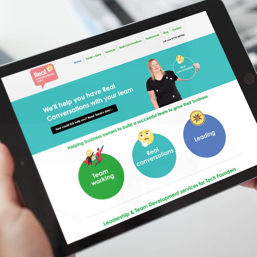 Glued Limited creative work: A person holds a tablet displaying a WordPress website design and build at affordable prices, featuring vibrant graphics about team development services, with sections on team working, real conversations, and leading. The site’s header includes navigation links and a contact number.